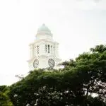 white concrete dome clock tower